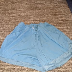 Teal running shorts